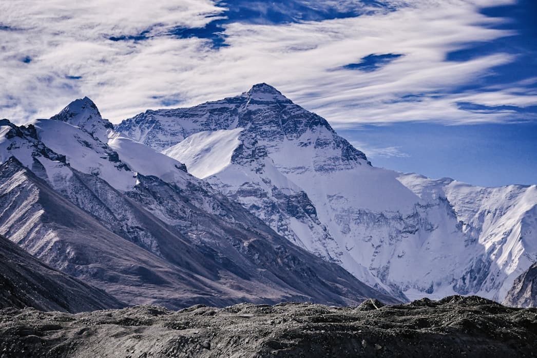 Snowy mountain (possibly Mount Everest or Kailash)